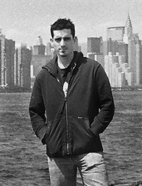 Carlos posing in front of the New York Skyline